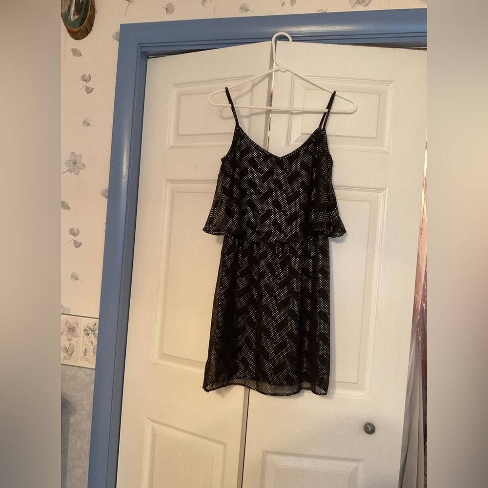 Black dress size small. Never worn